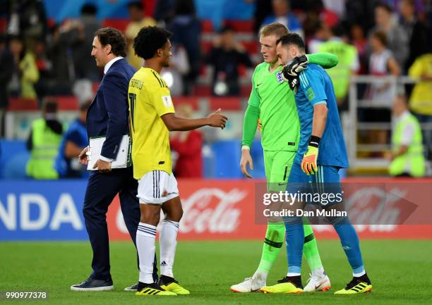 Jordan Pickford of England speaks with David Ospina of Colombia and Juan Cuadrado of Colombia after the 2018 FIFA World Cup Russia Round of 16 match...