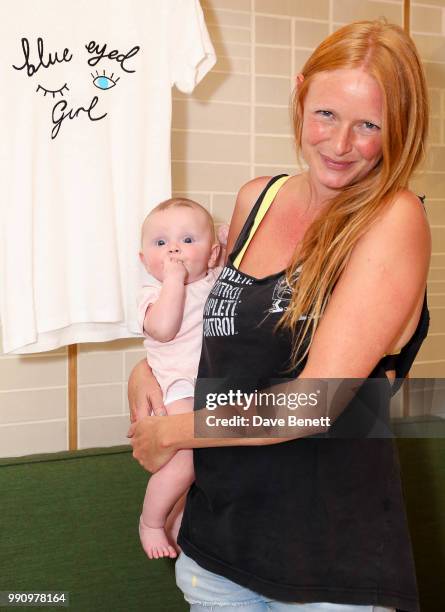 Olivia Ing and Baby Jemima attend Rotten Roach X Poppy Paper Cuts hosted by Marissa Montgomery at Selfridges on July 3, 2018 in London, England.