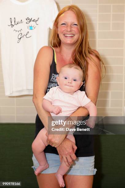 Olivia Ing and Baby Jemima attend Rotten Roach X Poppy Paper Cuts hosted by Marissa Montgomery at Selfridges on July 3, 2018 in London, England.