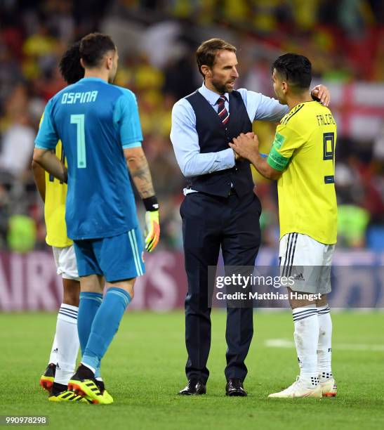 Gareth Southgate, Manager of England congratulates Radamel Falcao of Colombia during the 2018 FIFA World Cup Russia Round of 16 match between...