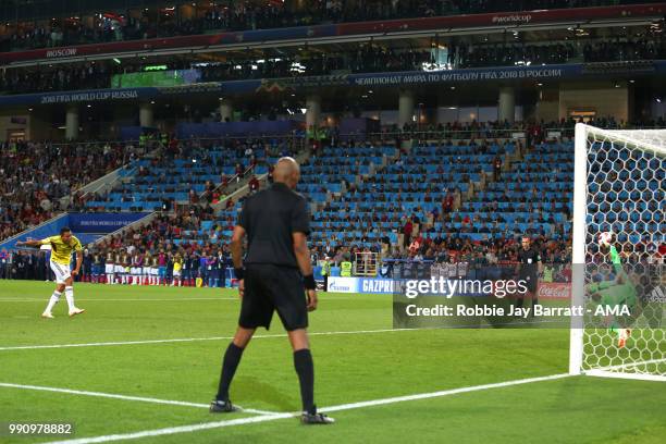 Jordan Pickford of England saves the penalty of Carlos Bacca of Colombia to secure victory in a penalty shootout at the end of extra time during the...