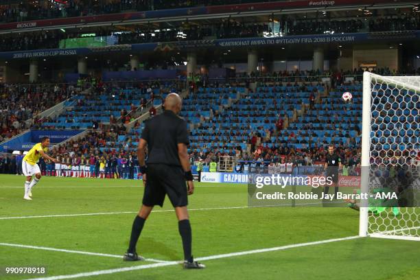 Jordan Pickford of England saves the penalty of Carlos Bacca of Colombia to secure victory in a penalty shootout at the end of extra time during the...