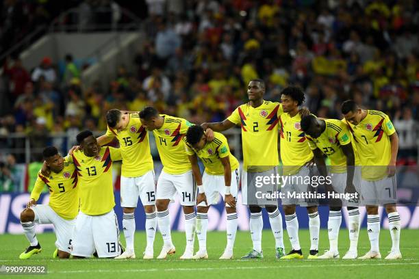 The Colombia players watch on as Eric Dier of England scores his sides winning penalty in the penalty shoot out during the 2018 FIFA World Cup Russia...