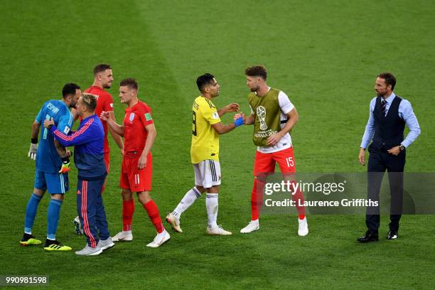 Radamel Falcao of Colombia shakes hands with Gary Cahill of England as David Ospina, Jordan Henderson, Jamie Vardy and Gareth Southgate following the...