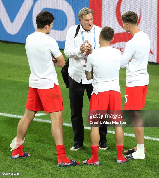 Glenn Hoddle, ex England speaks to Harry Maguire of England, Kieran Trippier of England and John Stones of England after the 2018 FIFA World Cup...