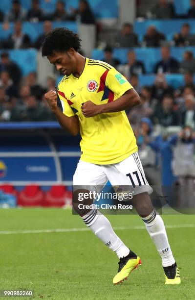 Juan Cuadrado of Colombia celebrates after scoring his sides second penalty during the 2018 FIFA World Cup Russia Round of 16 match between Colombia...