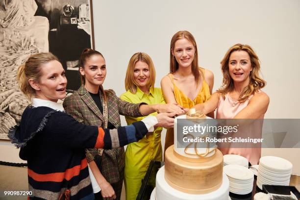 Lisa Martinek, Lisa Tomaschewsky, Ella Endlich, Esther Heesch and Bettina Cramer in front of an cake during the 20 years event of Luisa Cerano at...