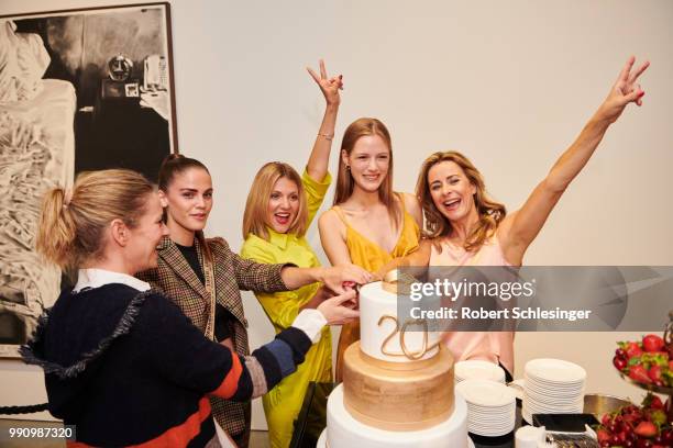 Lisa Martinek, Lisa Tomaschewsky, Ella Endlich, Esther Heesch and Bettina Cramer in front of an cake during the 20 years event of Luisa Cerano at...
