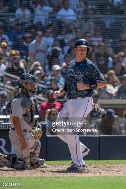 San Diego Padres Catcher A.J. Ellis looks on during a MLB game between the Pittsburgh Pirates and the San Diego Padres on July 01 at Petco Park in...