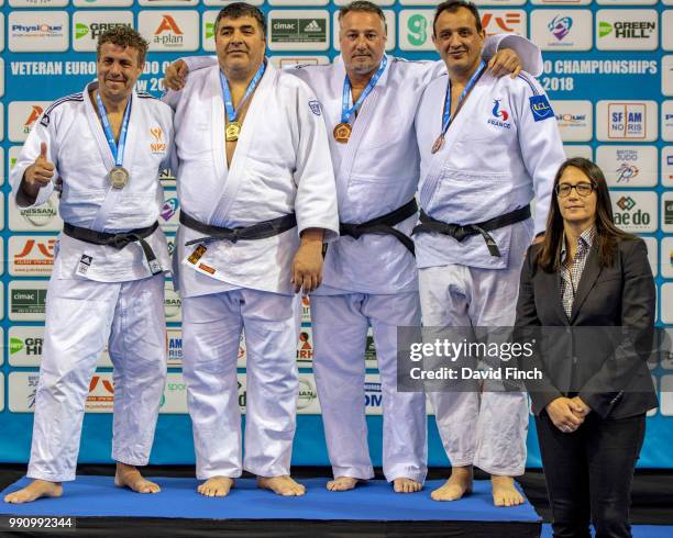 Over 100kg M5 medallists L-R: Silver; Viorel Marinescu , Gold; Rob Kroonen , Bronzes; Stefan Cristescu and Miled Trabelsi . The medals were presented...