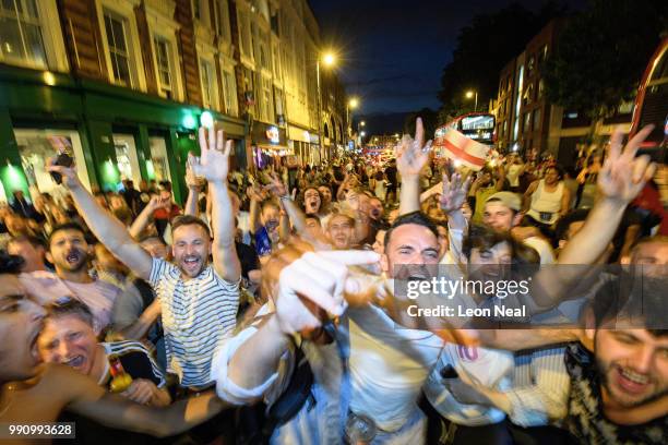 England fans celebrate in the streets after England win 4-3 on penalties, following the FIFA 2018 World Cup Finals match between Colombia and England...