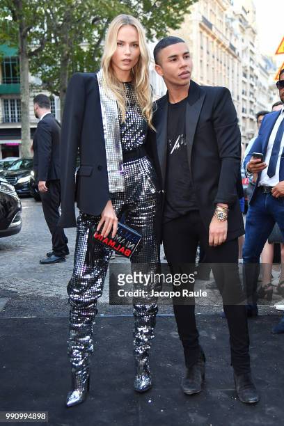 Natasha Poly and Olivier Rousteing arrive at the 'Vogue Foundation Dinner 2018' at Palais Galleria on July 3, 2018 in Paris, France.