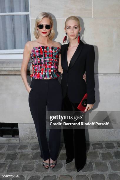 Sabine Getty and Poppy Delevingne attend the Giorgio Armani Prive Haute Couture Fall Winter 2018/2019 show as part of Paris Fashion Week on July 3,...