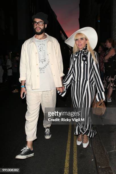 Leyman Lahcine and Paloma Faith seen attending HENI Gallery x adidas: #prouder - private view on July 3, 2018 in London, England.