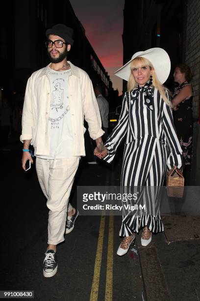 Leyman Lahcine and Paloma Faith seen attending HENI Gallery x adidas: #prouder - private view on July 3, 2018 in London, England.