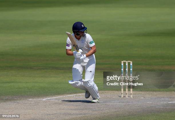 Tom Weatherley of Hampshire bats during day four of the Specsavers County Championship game at Old Trafford on June 28, 2018 in Manchester, England.