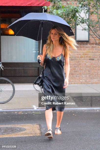 Heidi Klum seen out and about on a rainy day in Manhattan on July 3, 2018 in New York City.