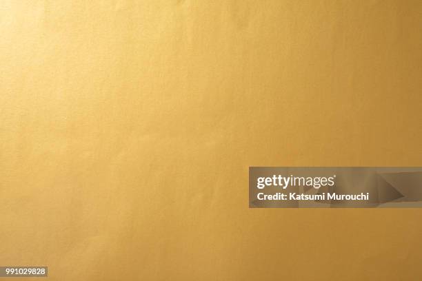 golden paper texture background - gold leaf stock pictures, royalty-free photos & images