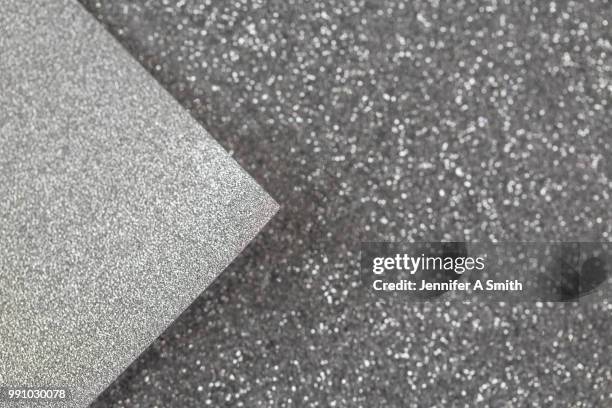 silver glitter paper - cardboard cut out stock pictures, royalty-free photos & images