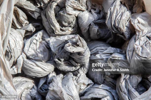 single use plastic bags - plastic bag stock pictures, royalty-free photos & images