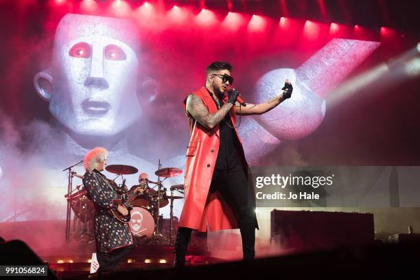 Roger Taylor, Adam Lambert & Brian May of Queen perform at SSE Arena, Wembley on July 1, 2018 in London, England.