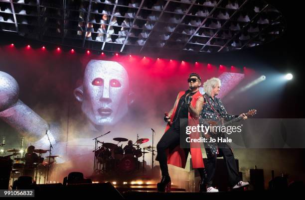 Adam Lambert & Brian May of Queen perform at The O2 Arena on July 1, 2018 in London, England.