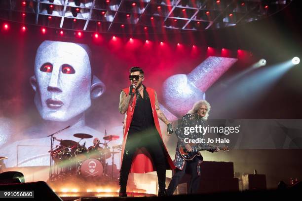 Adam Lambert & Brian May of Queen perform at The O2 Arena on July 1, 2018 in London, England.