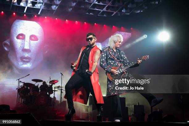 Adam Lambert & Brian May of Queen perform at SSE Arena, Wembley on July 1, 2018 in London, England.