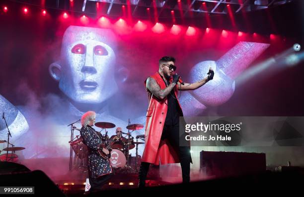 Adam Lambert & Brian May of Queen perform at The O2 Arena on July 1, 2018 in London, England.