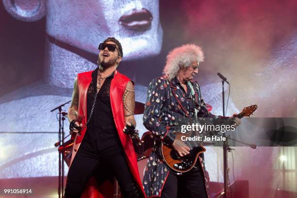 Adam Lambert & Brian May of Queen perform at The O2 Arena on July 1, 2018 in London, England.