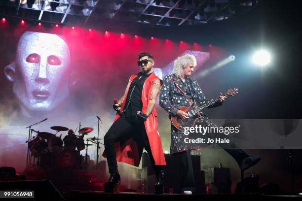 Adam Lambert & Brian May of Queen perform at SSE Arena, Wembley on July 1, 2018 in London, England.