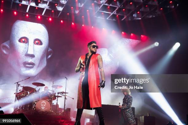 Adam Lambert & Brian May of Queen perform at The O2 Arena on July 1, 2018 in London, England.