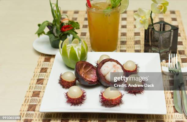 rambutan with mangostane - rambutan stock pictures, royalty-free photos & images