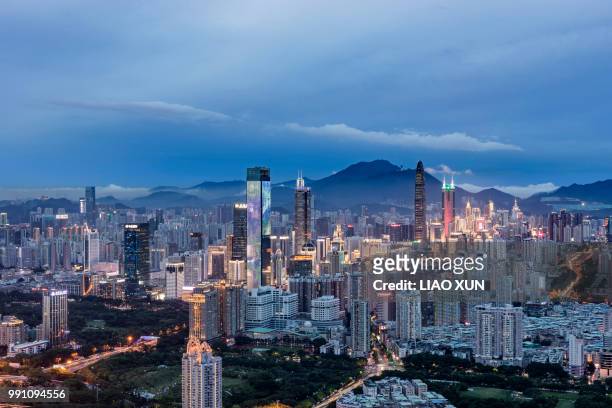 panoramic view of shenzhen skyscrapers at dawn - liao xun stock-fotos und bilder