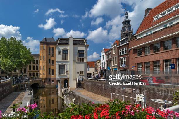 gouda old houses and canal, netherlands, - gouda stock pictures, royalty-free photos & images