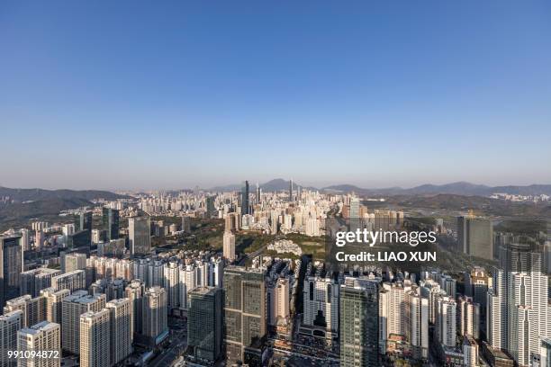 aerial view of shenzhen skyscrapers at dawn - liao xun stock-fotos und bilder