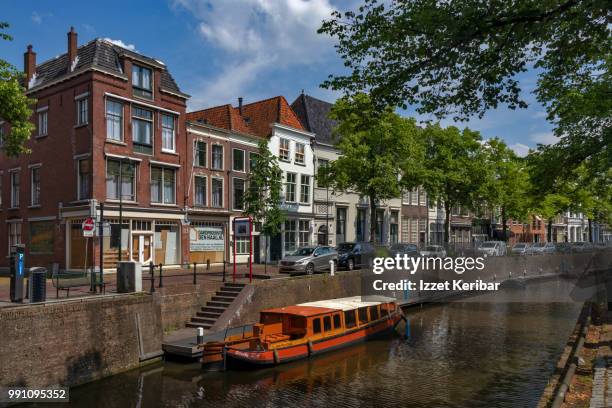 gouda old houses and canal, netherlands, - gouda stock pictures, royalty-free photos & images