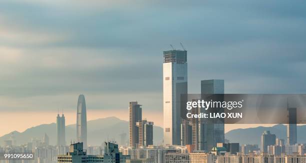 aerial view of shenzhen skyscrapers at dawn - liao xun stock-fotos und bilder