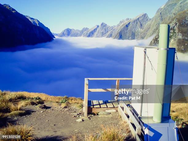 mackinnon pass newzealand - mackinnon stock pictures, royalty-free photos & images