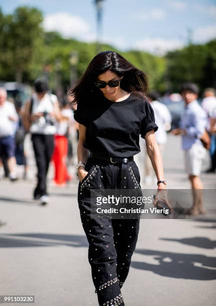 Barbara Martelo wearing black cropped pants and tshirt is seen outside Chanel on day three during Paris Fashion Week Haute Couture FW18 on July 2,...