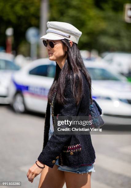 Barbara Martelo wearing black cropped pants and tshirt is seen outside Chanel on day three during Paris Fashion Week Haute Couture FW18 on July 2,...