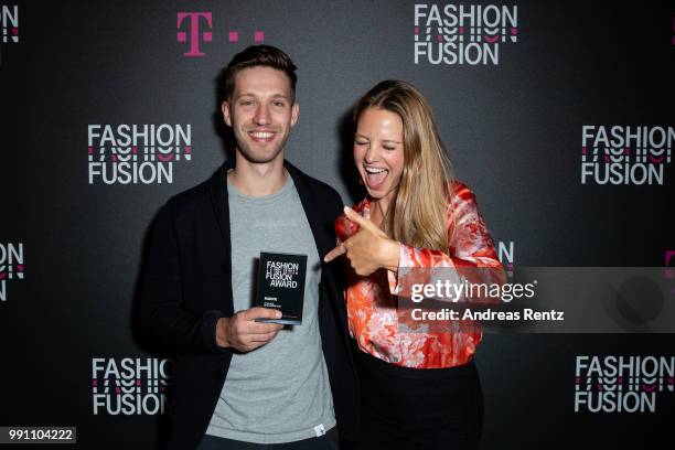 Nele Koestler and Jonas Diezun of Radice pose with their award during the Fashion Fusion award ceremony at me Collectors Room on July 3, 2018 in...