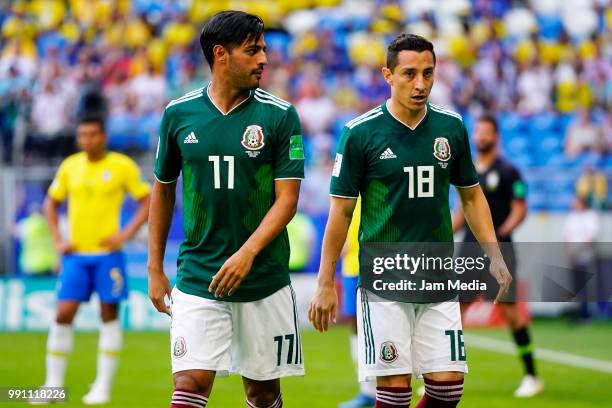 Carlos Vela and Andres Guardado of Mexico react during the 2018 FIFA World Cup Russia Round of 16 match between Brazil and Mexico at Samara Arena on...