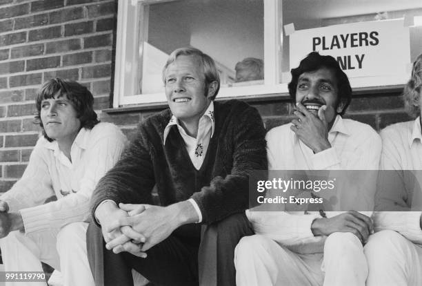 South African cricketer Tony Greig , captain of Sussex County Cricket Club, watching a game between Essex and Sussex in Ilford, UK, 11th June 1973.