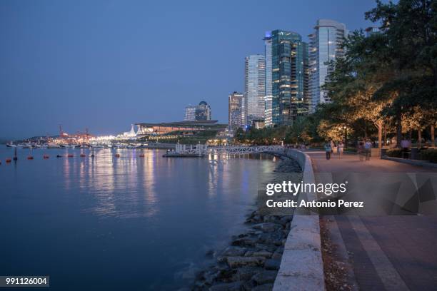 seawall coal harbour - coal harbour stock pictures, royalty-free photos & images