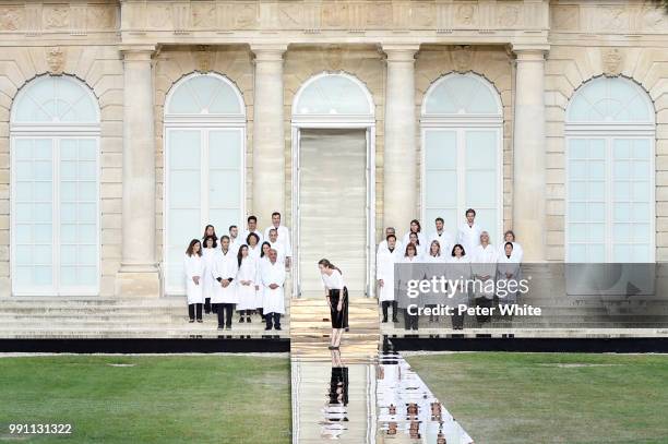 Fashion designer Clare Waight Keller acknowledges the audience during the Givenchy Haute Couture Fall Winter 2018/2019 show as part of Paris Fashion...