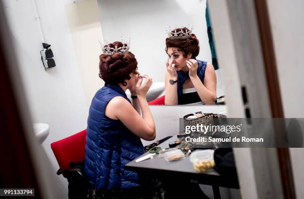 Dancer prepares backstage ahead of a rehearsal for 'El lago de Los Cisnes'on July 3, 2018 in Madrid, Spain.