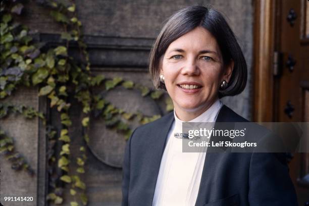 Portrait of American academic Professor Elizabeth Warren as she poses at the door to the University of Pennsylvania Law School's Silverman Hall,...