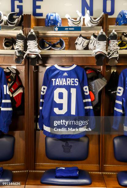 The jersey of John Tavares of the Toronto Maple Leafs, hangs in the Toronto Maple Leafs' dressing room, after Tavares signed with the Toronto Maple...