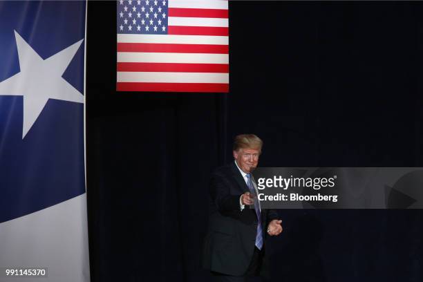 President Donald Trump points after speaking during a Salute to Service dinner in White Sulphur Springs, West Virginia, U.S., on Tuesday, July 3,...
